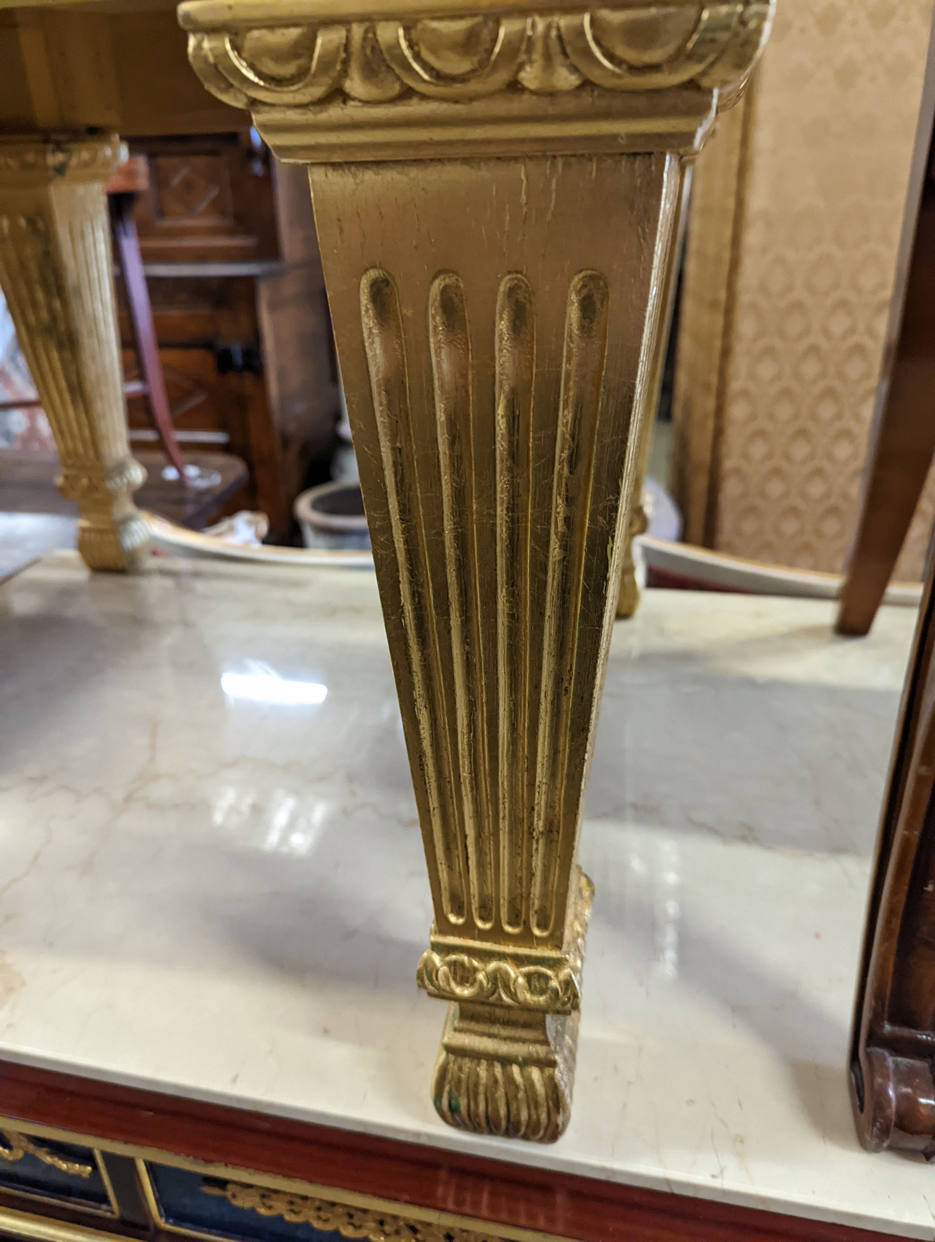 An Empire style parcel gilt mahogany elbow chair together with a similar square low occasional table, width 70cm, height 55cm